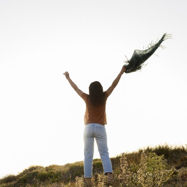 back-view-carefree-woman-nature