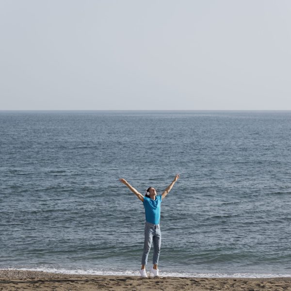 full-shot-man-alone-beach