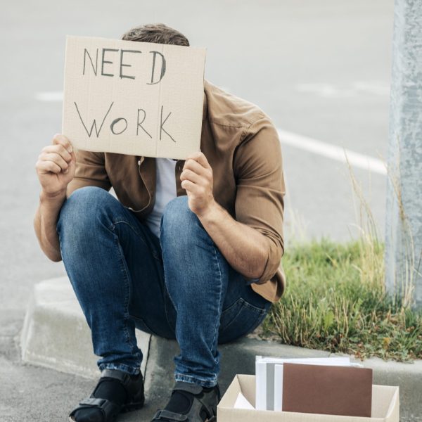 full-shot-man-sitting-outdoors